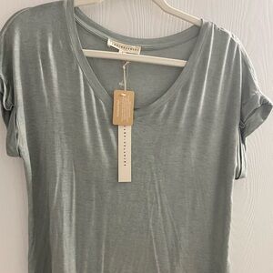 Women’s medium tee shirt.  Brand new with tags.